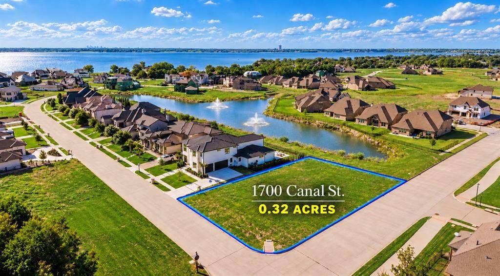 Corner lot spanning 0.32 acres, situated in a community featuring a central pond with water fountains and proximity to a large body of water