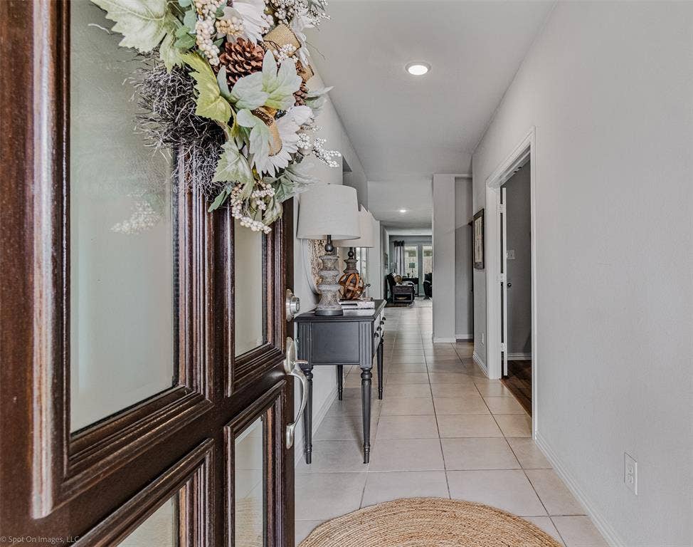 1612 Village Creek Drive, Forney, TX 75126 Corridor featuring light tile patterned floors and recessed lighting