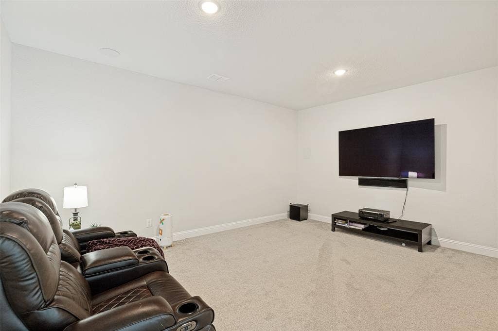 16931 Maple Bend Drive, Frisco, TX 75035 Neutral-toned room featuring wall-to-wall carpeting and recessed ceiling lighting