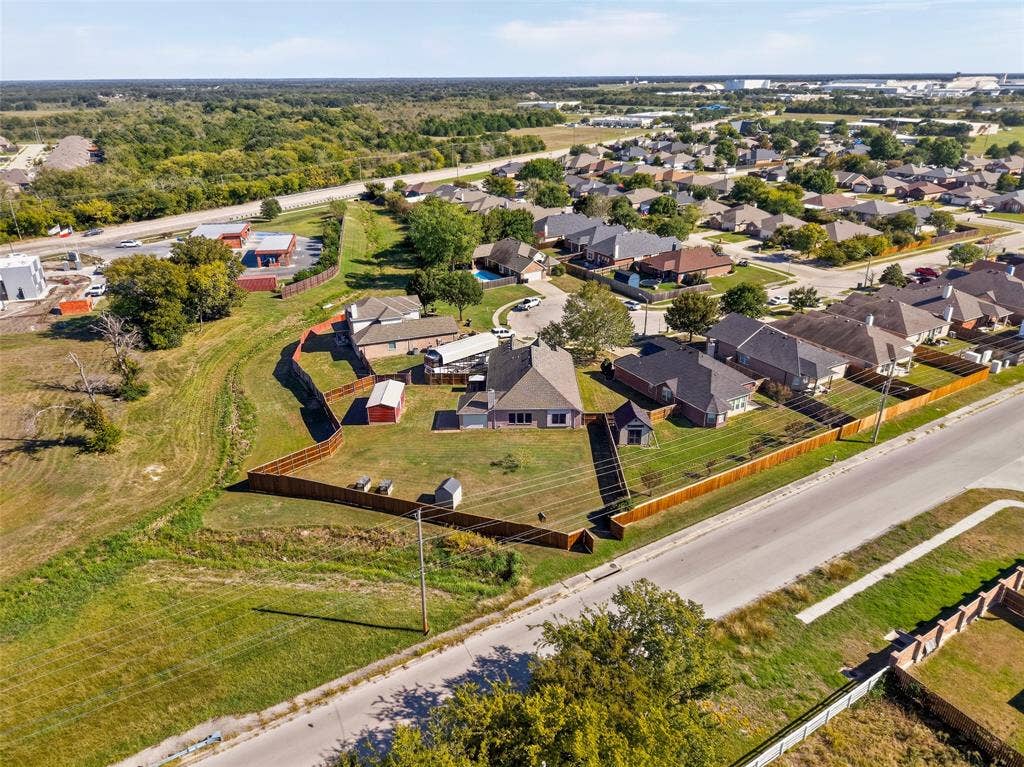 8700 Broken Bow Drive, Greenville, TX 75402 Alternate view of expansive backyard.