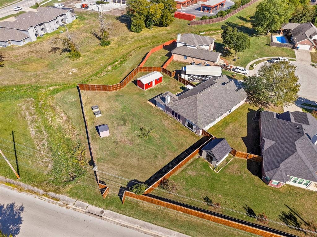 8700 Broken Bow Drive, Greenville, TX 75402 BEAUTIFUL LARGE BACK YARD. SO MANY OPTIONS!
