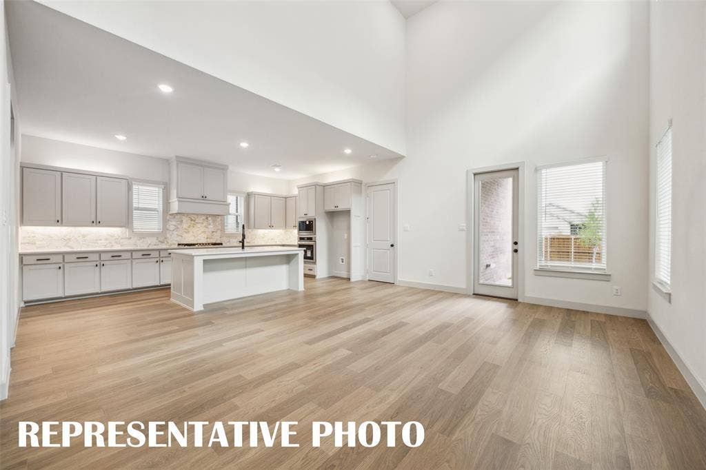 You'll love hosting the entire family for holiday get togethers in this spacious family room.  REPRESENTATIVE PHOTO