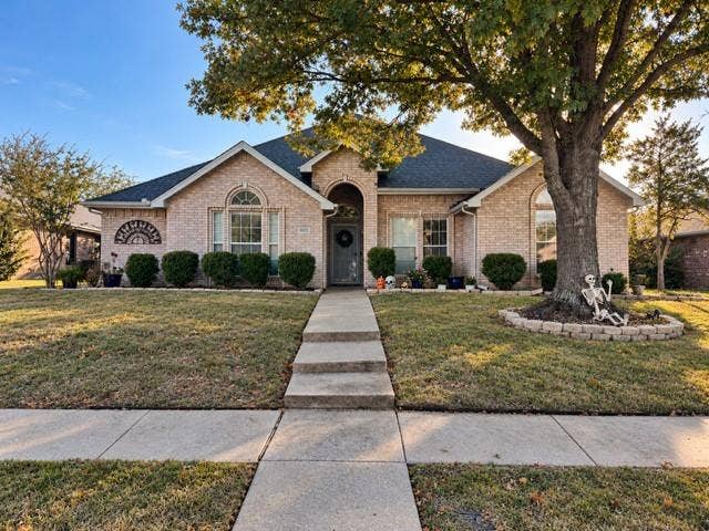 8813 Pheasant Run Drive, Rowlett, TX 75089 Mature tree very well lanscaped execelent curb appeal