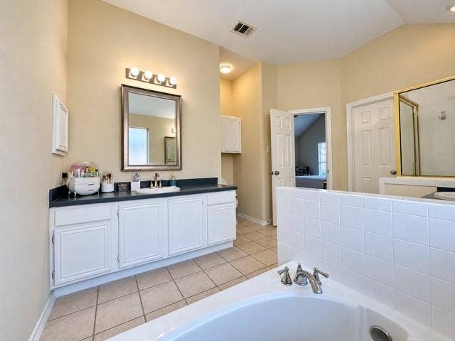 8813 Pheasant Run Drive, Rowlett, TX 75089 Double vanities his and hers Jetted tub