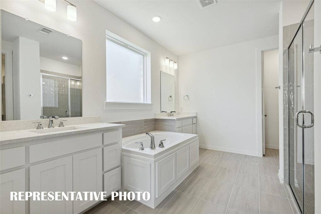 Plenty of room for two in this wonderful owner's bath! REPRESENTATIVE PHOTO