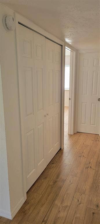 between kitchen and primary bedroom