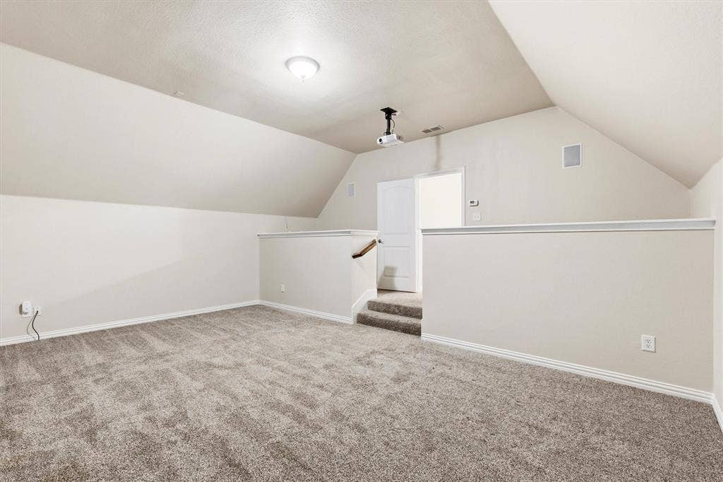 7710 Keith Lane, Sachse, TX 75048 Enjoy movie nights in this media room!
