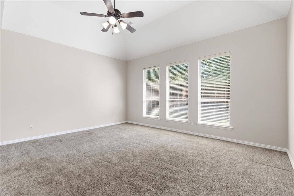 7710 Keith Lane, Sachse, TX 75048 Enjoy the natural light in this beautiful primary bedroom.