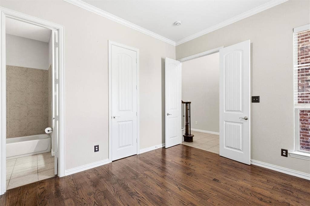 7710 Keith Lane, Sachse, TX 75048 Office at the front of the home offers quiet privacy with access to a secondary downstairs full bath