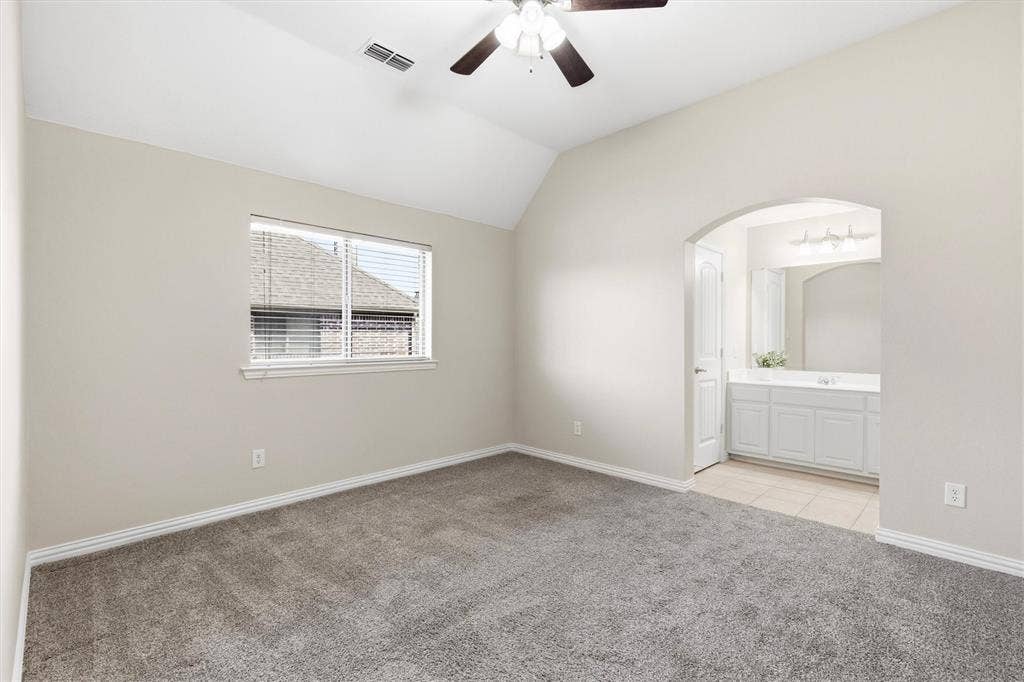 7710 Keith Lane, Sachse, TX 75048 Upstairs bedroom with ensuite bath