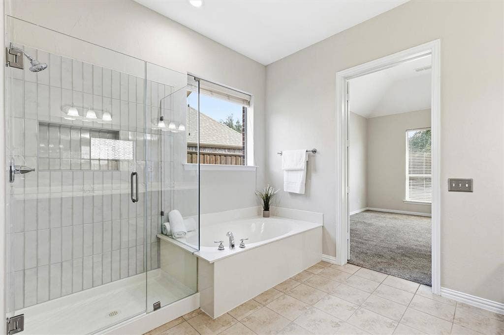 7710 Keith Lane, Sachse, TX 75048 Spa like bathroom. Newly updated shower