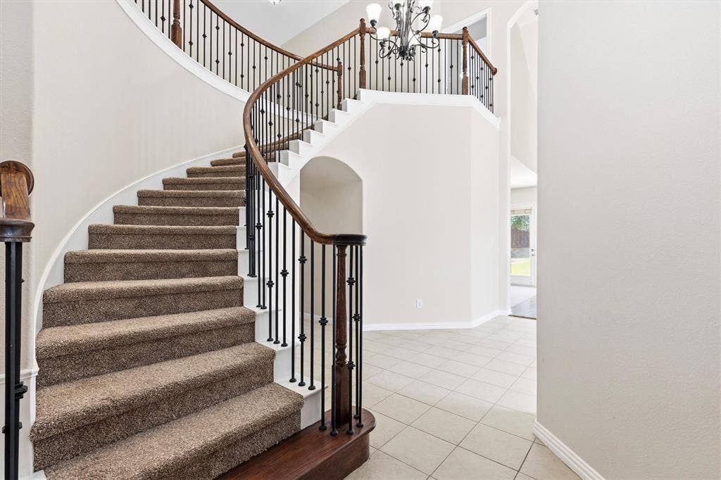 7710 Keith Lane, Sachse, TX 75048 Grand spiral staircase!