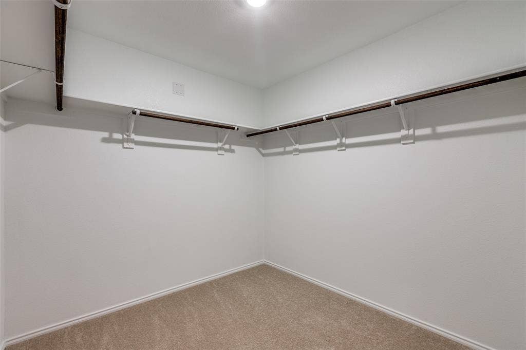 9216 Grackle Place, McKinney, TX 75071 Walk in closet featuring carpet floors