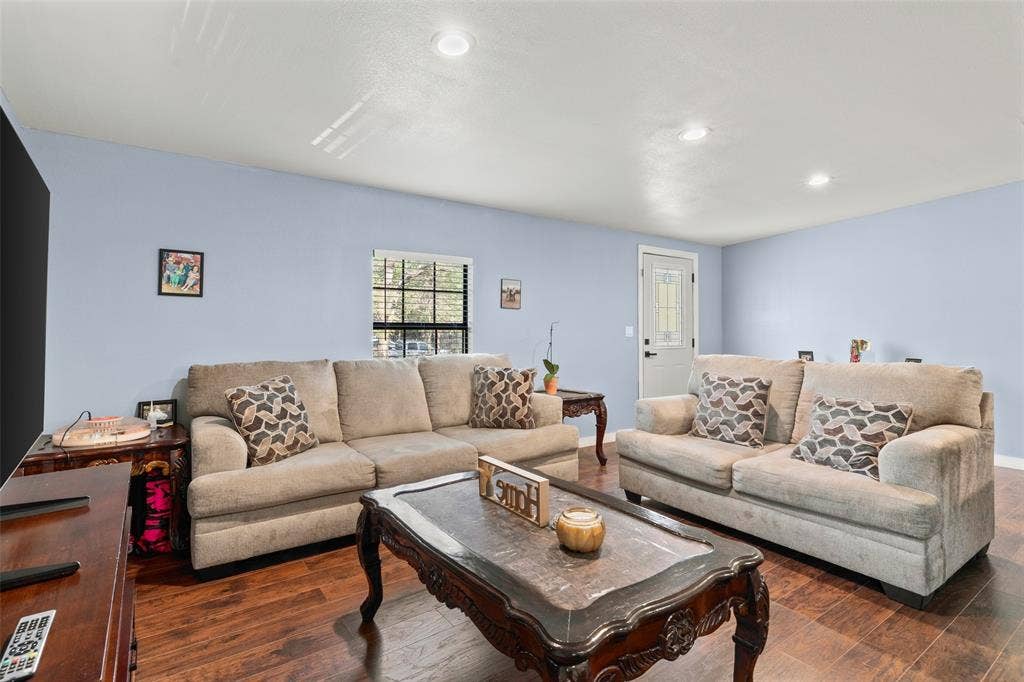 1219 Green Tree Acres Road, Kemp, TX 75143 Living area featuring wood-finish flooring, recessed lighting, and a single-light exterior door with a decorative glass insert