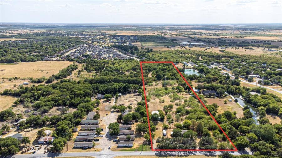 Property photo for 2715 NW Main Street, Ennis, TX