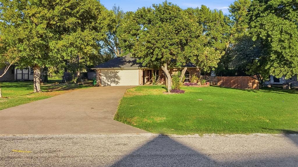 1903 W Spanish Oak Drive, Granbury, TX 76048 Full front view of the home