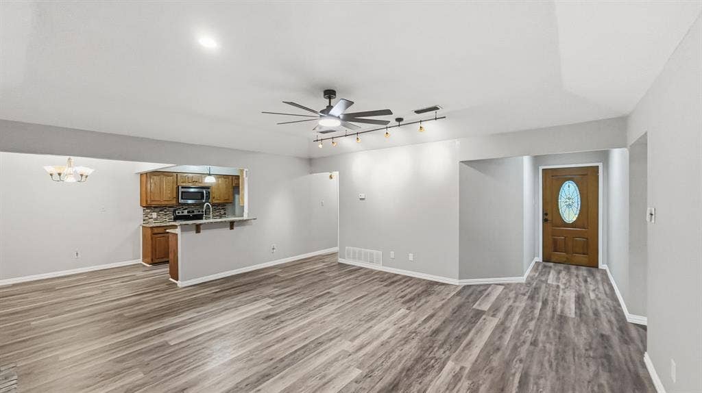 1903 W Spanish Oak Drive, Granbury, TX 76048 Full living room view looking to front door