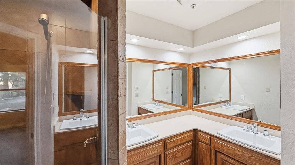 1903 W Spanish Oak Drive, Granbury, TX 76048 Primary bath with double sinks and walk in shower