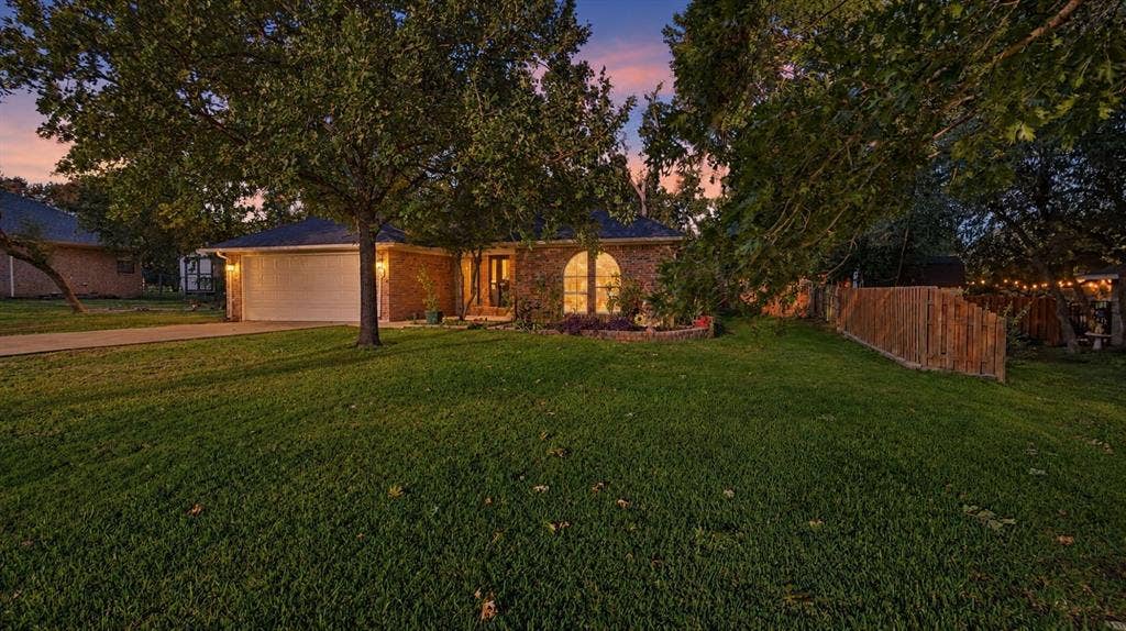1903 W Spanish Oak Drive, Granbury, TX 76048 Large mature trees in this front yard!