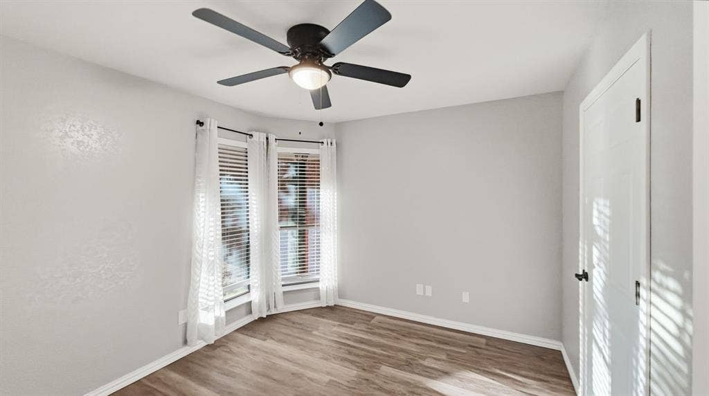 1903 W Spanish Oak Drive, Granbury, TX 76048 Bedroom 2 without virtual staging furniture