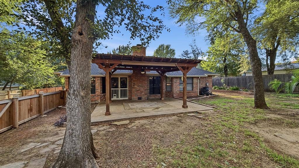 1903 W Spanish Oak Drive, Granbury, TX 76048 Covered back patio