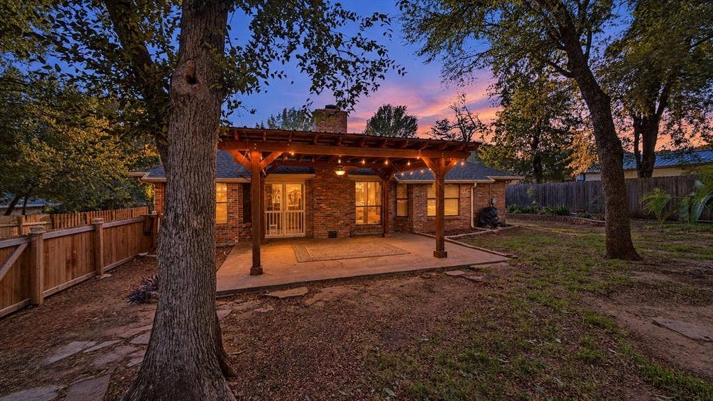 1903 W Spanish Oak Drive, Granbury, TX 76048 Large back yard with super size covered patio.
