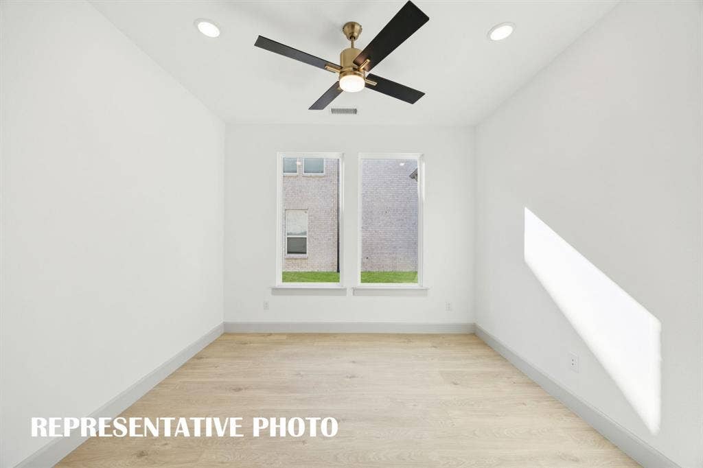 1401 Mistflower Lane, Celina, TX 75009 The professional needing to work from home will appreciate this light filled, private home office. REPRESENTATIVE PHOTO