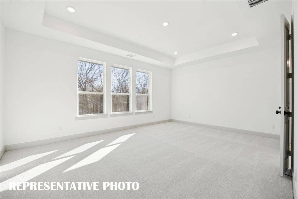 1401 Mistflower Lane, Celina, TX 75009 Located at the rear of the home for additional privacy, this dreamy owner's suite was designed for rest and relaxation! REPRESENTATIVE PHOTO