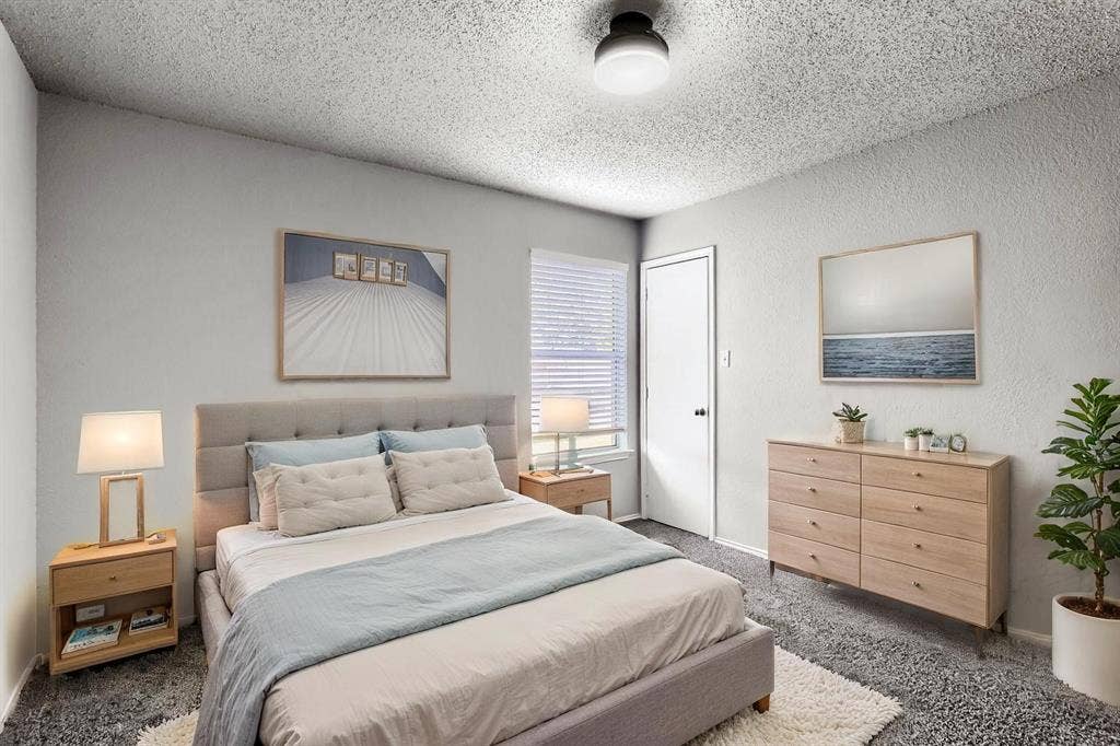 2039 Angelica Way, Dallas, TX 75217 Virtually Staged -Neutral-toned room featuring wall-to-wall carpeting, textured ceiling, flush-mount lighting, and window blinds