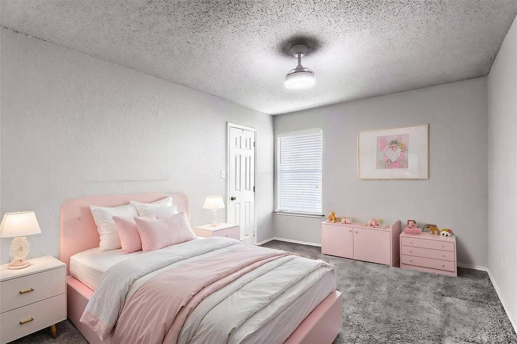 2039 Angelica Way, Dallas, TX 75217 Room featuring neutral wall finishes, grey carpeting, a multi-panel interior door, and a ceiling-mounted light fixture