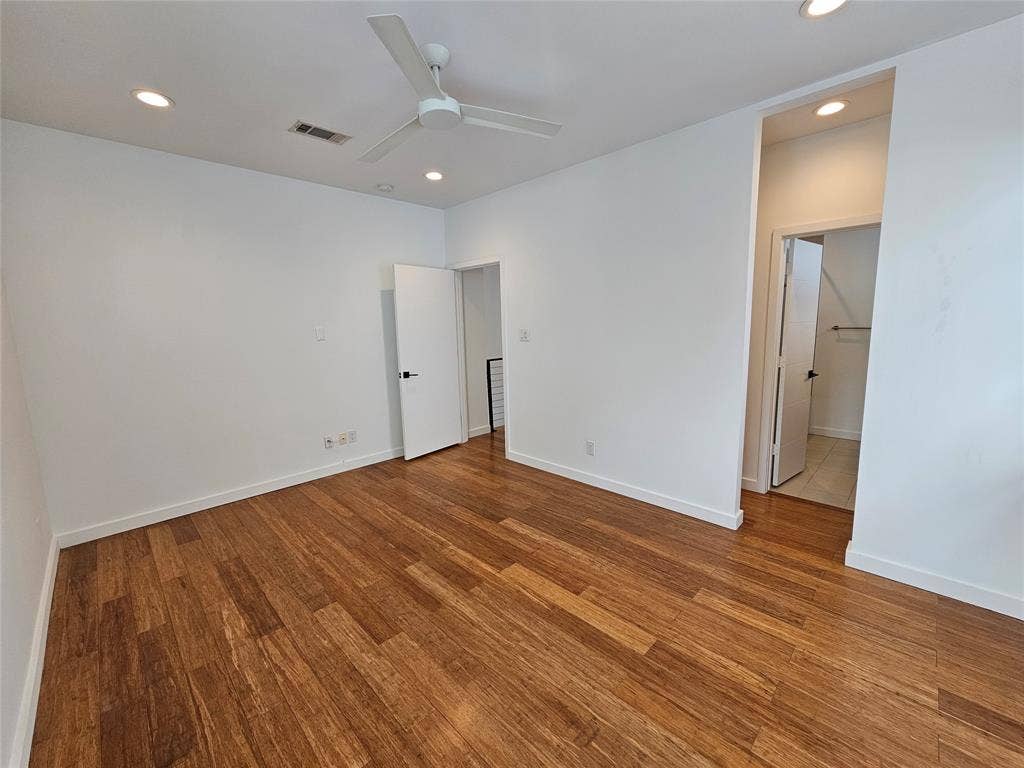4215 Roseland Avenue, Dallas, TX 75204 Room featuring wood-finish flooring, recessed lighting, a modern ceiling fan, and white interior doors