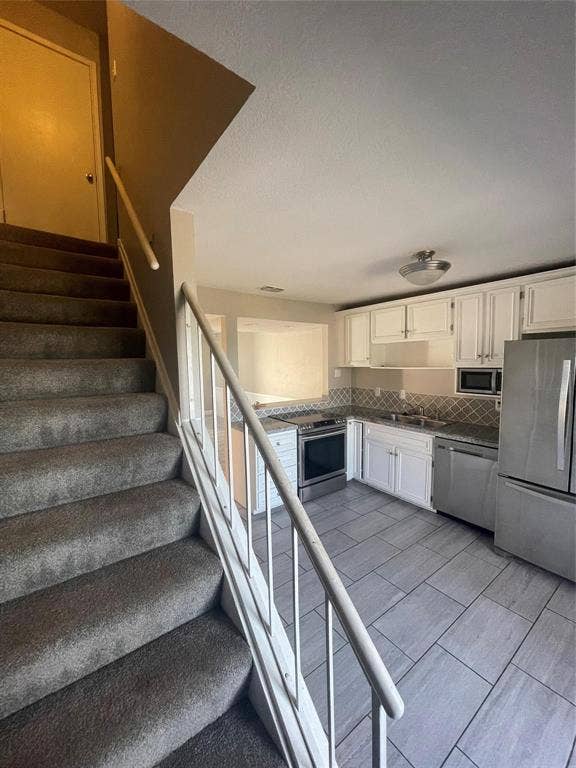 Stairs featuring sink