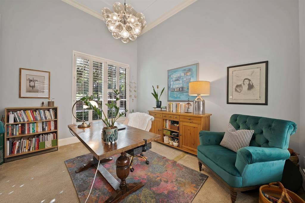 2141 Waterrock Drive, Allen, TX 75013 High-ceiling room featuring a statement multi-globe chandelier and white plantation shutters