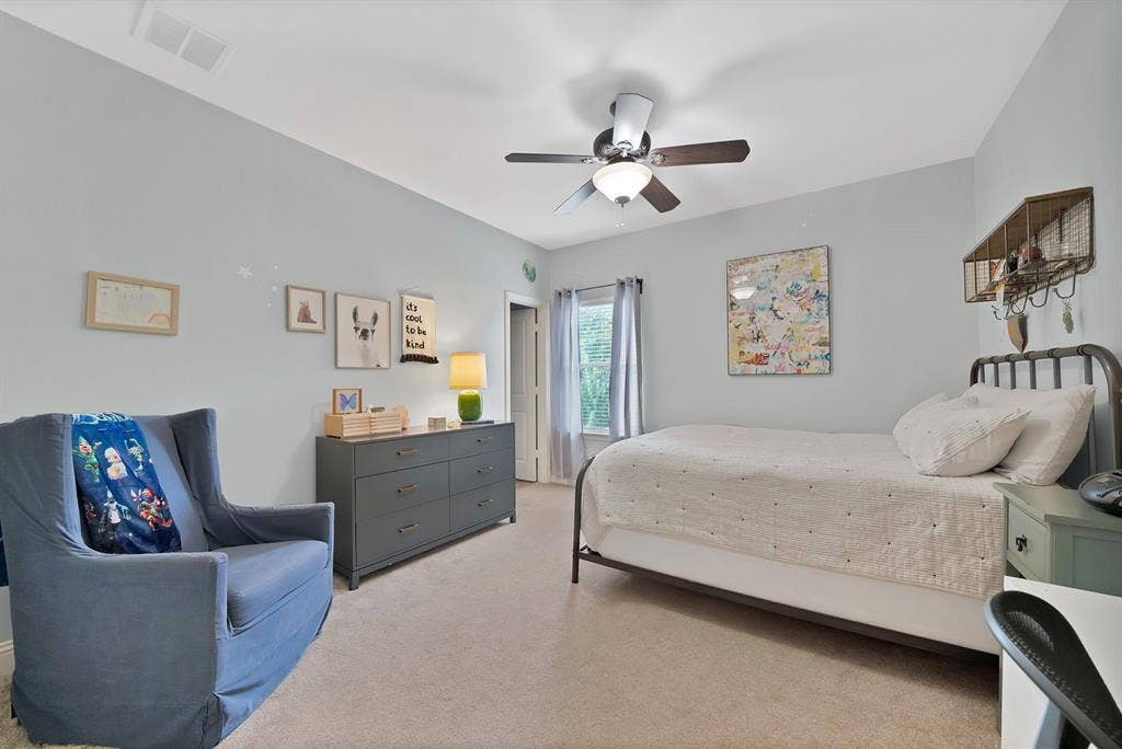 2141 Waterrock Drive, Allen, TX 75013 Neutral-toned carpeted flooring, multi-speed ceiling fan with integrated lighting, and window with natural light exposure