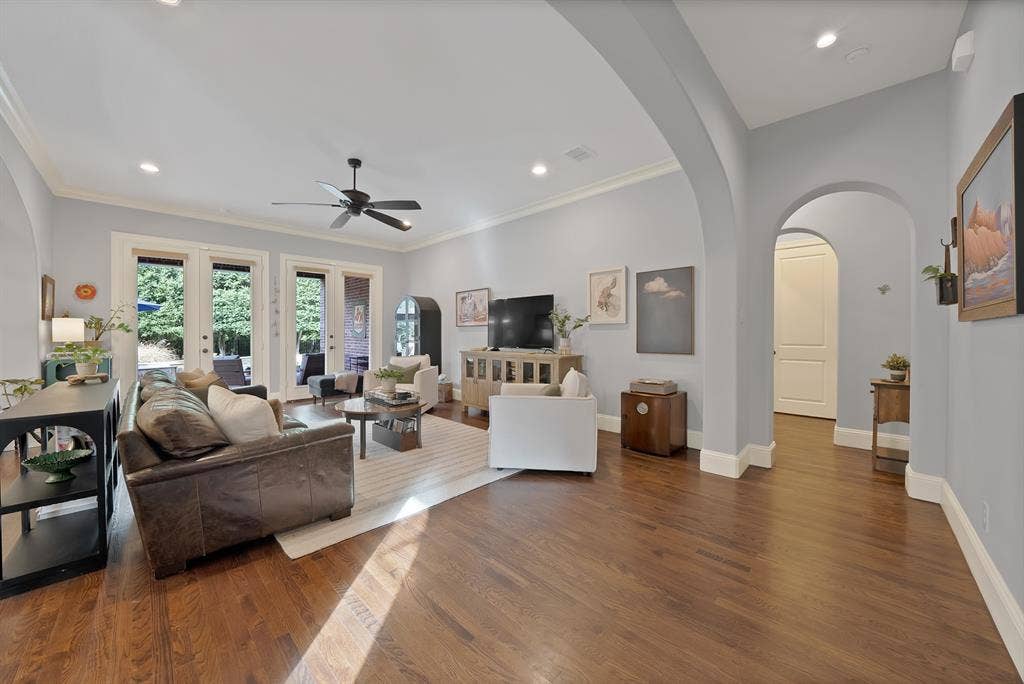 2141 Waterrock Drive, Allen, TX 75013 Spacious interior featuring wood-finish flooring, recessed lighting, crown molding, and architectural arched doorways