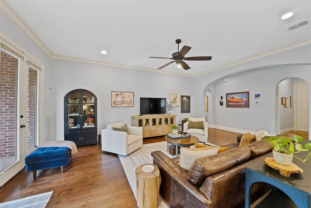 2141 Waterrock Drive, Allen, TX 75013 Living area featuring hardwood flooring, recessed lighting, crown molding, arched entryways, and a ceiling fan