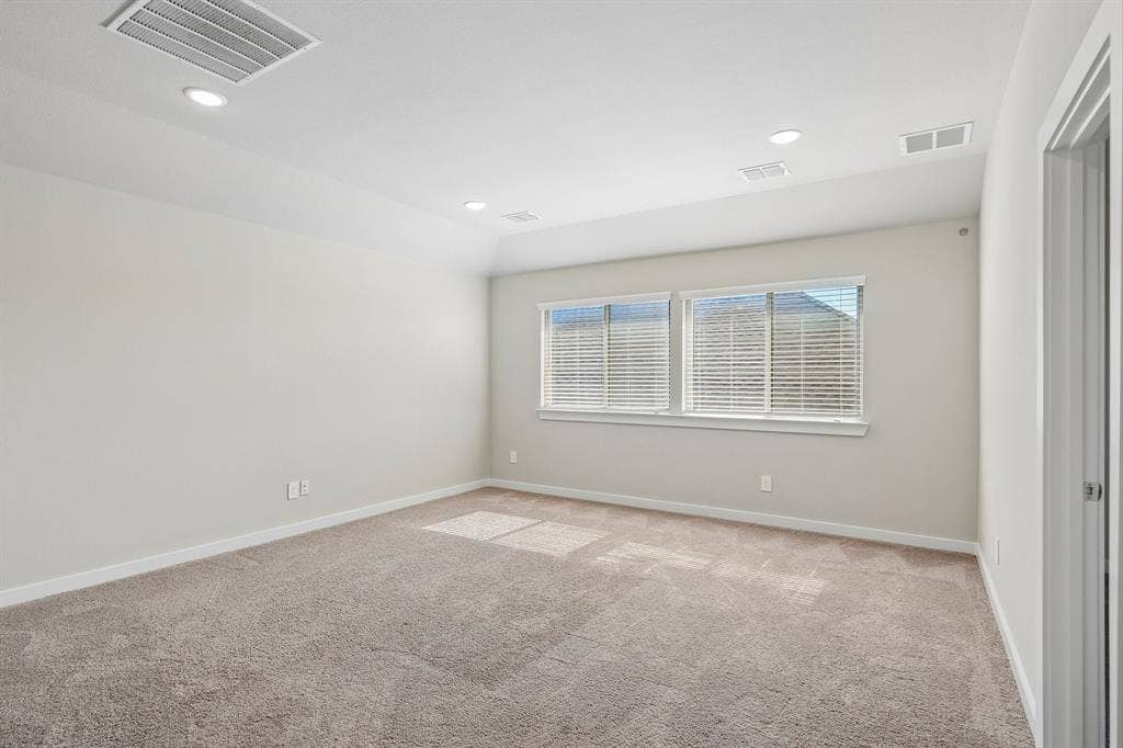 135 Lost Maples Way, Waxahachie, TX 75165 Tray ceiling, neutral wall tones, recessed lighting, and wall-to-wall carpeting