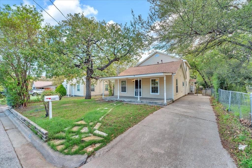 Front unit is smaller unit (2 br, 1 ba). Driveway runs the length of the full duplex with direct access to the back unit (2007 addition, 3 br, 2 ba, flex space).