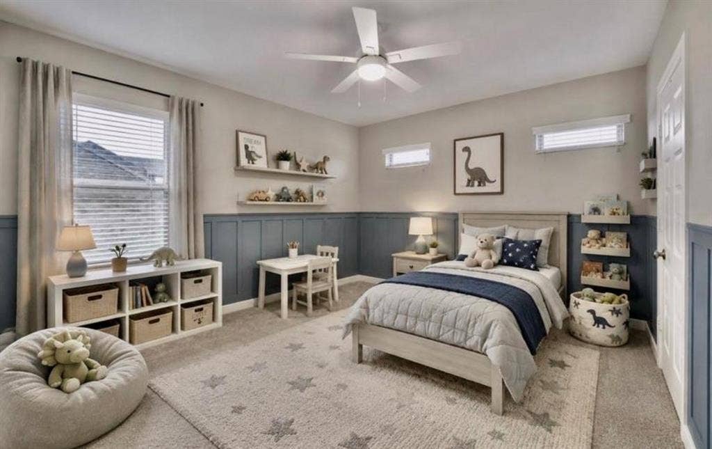 Room featuring two-tone wall paneling, wall-to-wall carpeting, ceiling fan with integrated lighting, and multiple horizontal windows
