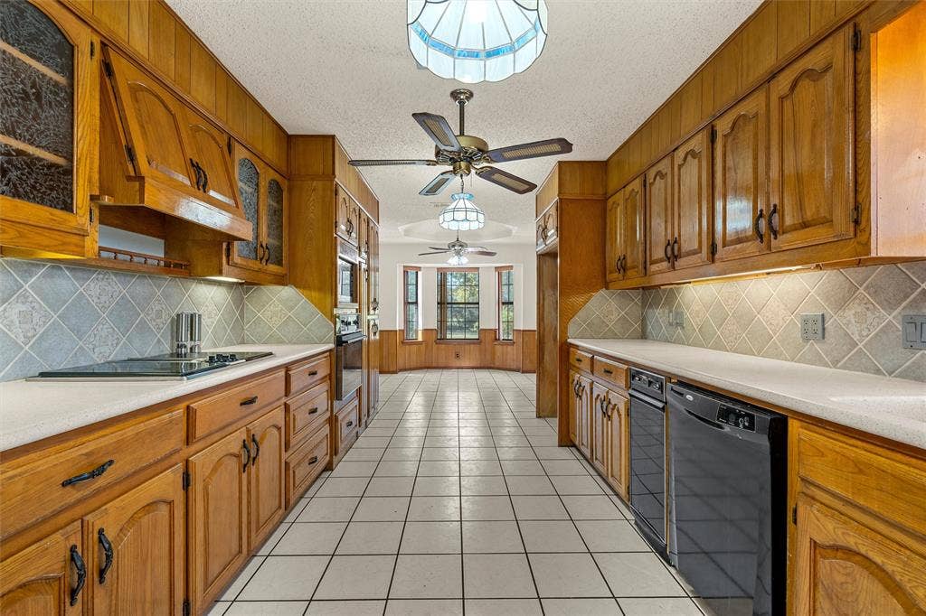kitchen leading into breakfast area