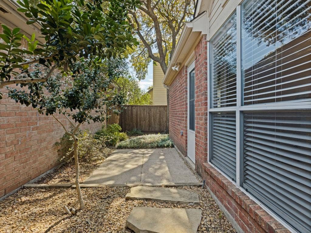 2206 Jasmine Lane, Garland, TX 75044 Patio with access to front sidewalk to driveway