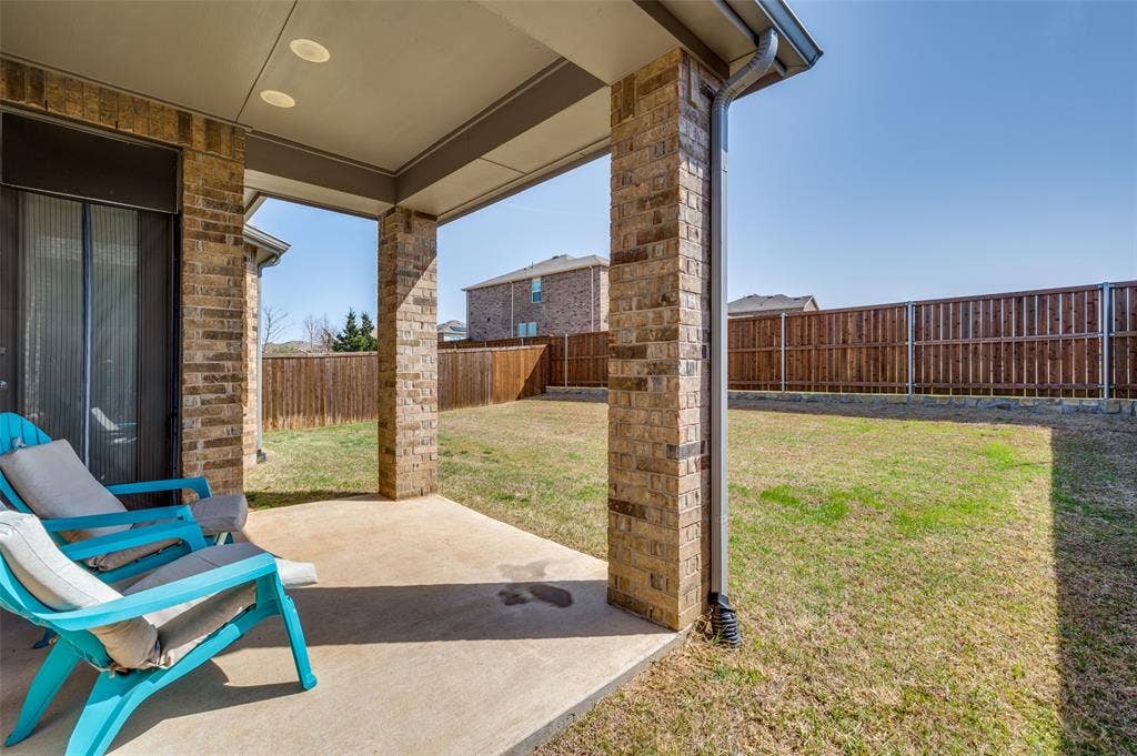 1520 Gelding Drive, Aubrey, TX 76227 Fenced backyard featuring a patio area