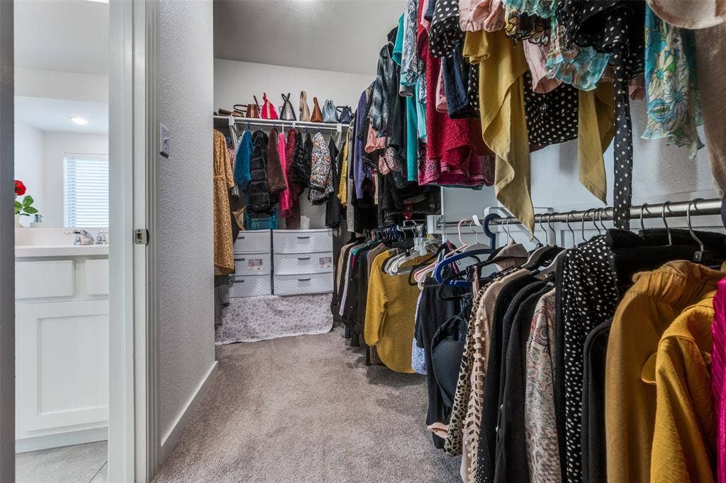 1520 Gelding Drive, Aubrey, TX 76227 Spacious closet with light colored carpet