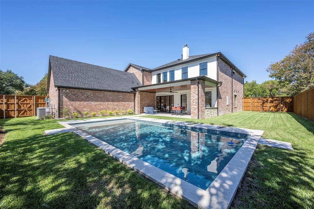 Spacious lot with lots of space to play and 8' privacy fence