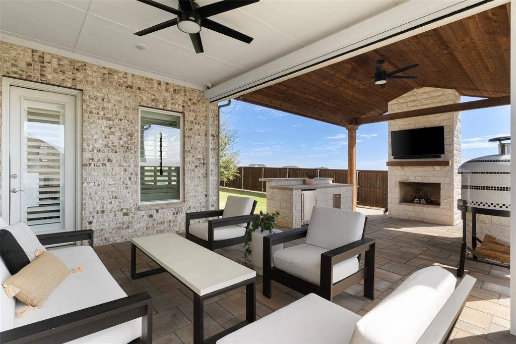 Outdoor Living area with auto shades!