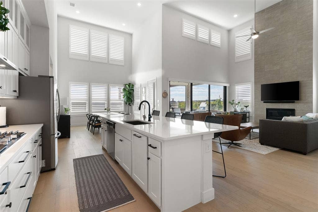 Open Concept w Plantation Shutters throughout