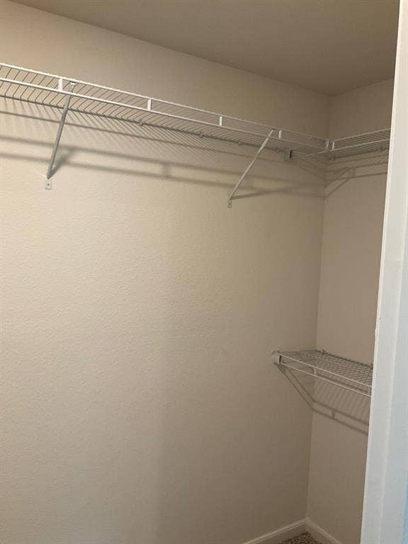 325 Stone Court, Princeton, TX 75407 Walk-in storage space featuring multi-level white wire shelving