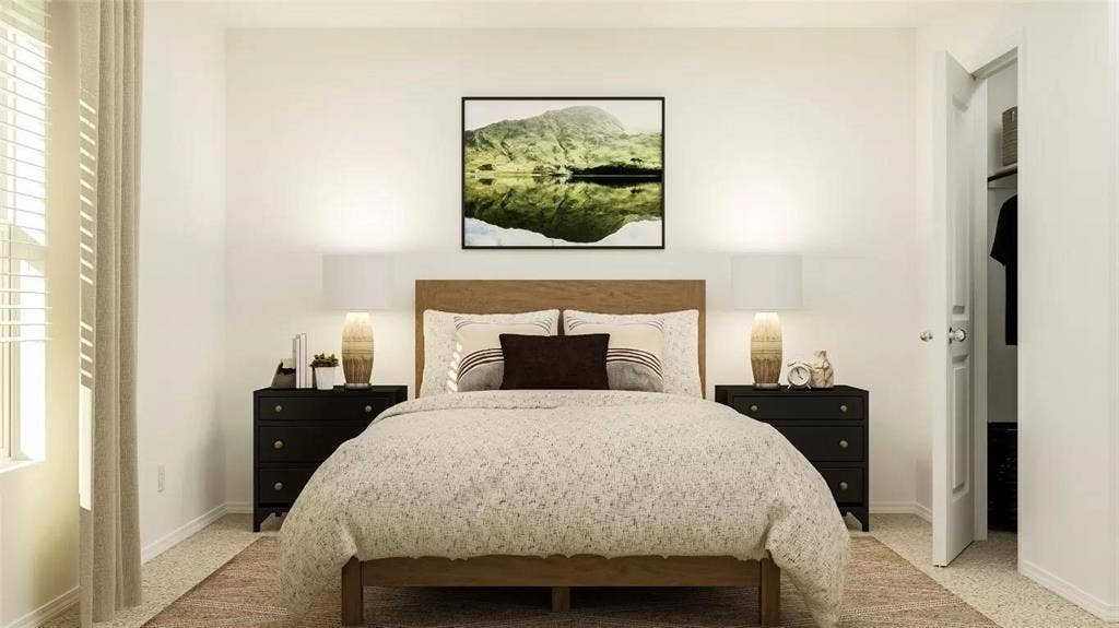 116 Radish Road, Princeton, TX 75407 Neutral-toned room featuring light-colored wall-to-wall carpeting, horizontal window blinds, and a built-in closet with a hinged door