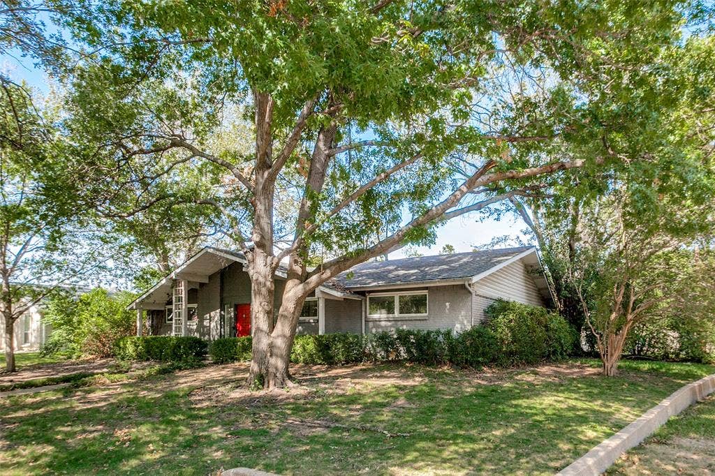 12515 Cedar Bend Drive, Dallas, TX 75244 Incredible corner lot with a canopy of mature trees.