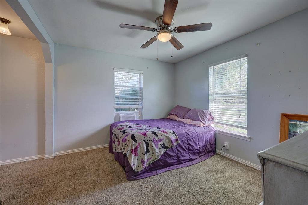 901 Elizabeth Boulevard, Granbury, TX 76048 Front bedroom - window unit will be removed